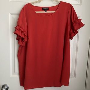 Lane Bryant. Size 20. Ruffle sleeve reddish Orange top. (Tub A)
